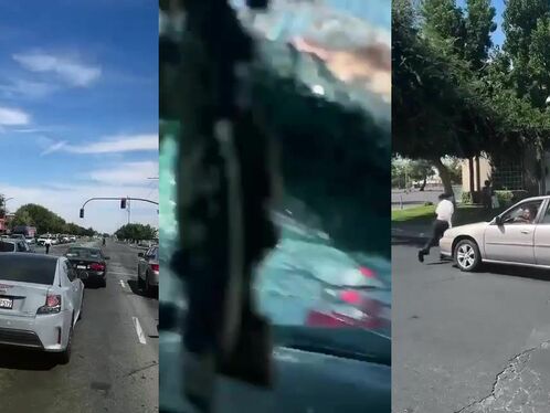 Elderly man bends over to pick up something in the middle of the street
