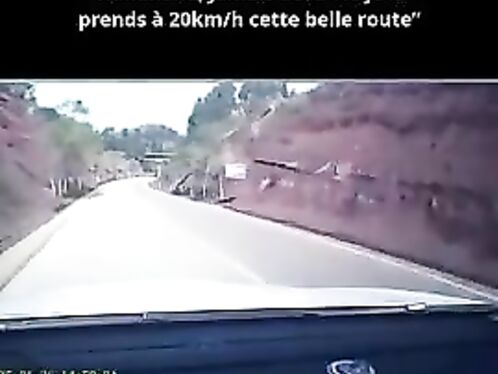 Car veers off road as driver struggles with curve