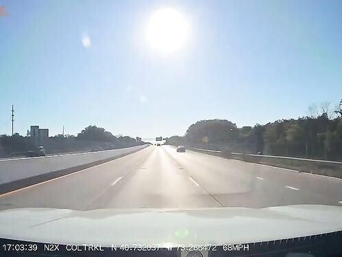 Driver narrowly misses truck that kicks up massive dust cloud