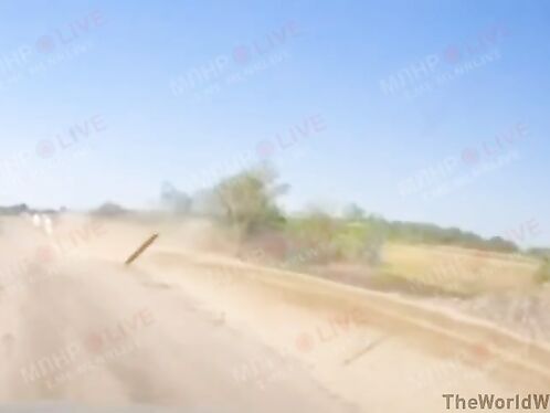 Motorcycle rider crashes on a dirt road