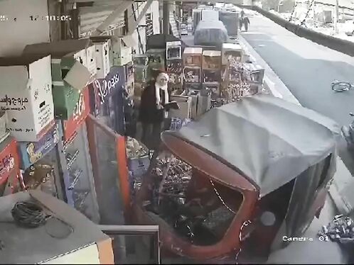 Man robbed at gunpoint outside of shop