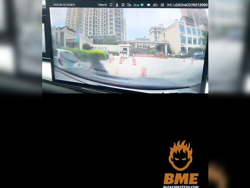 Car crashes into street divider and another car by mistake