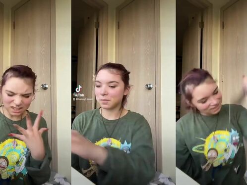 Woman fights and loses to a doorknob while posing